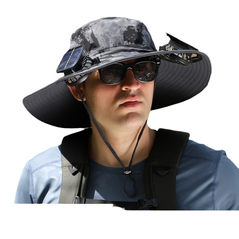 Person wearing a large sun hat with a solar panel, sunglasses, and a backpack on a white background