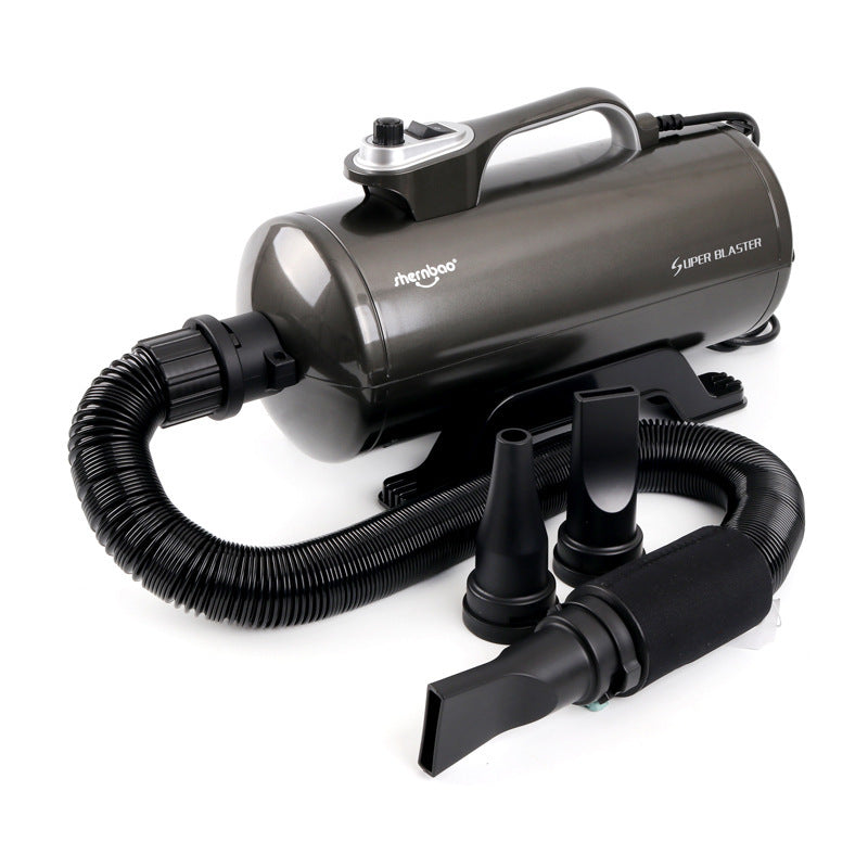 Black and gray hair dryer with attachments on a white background