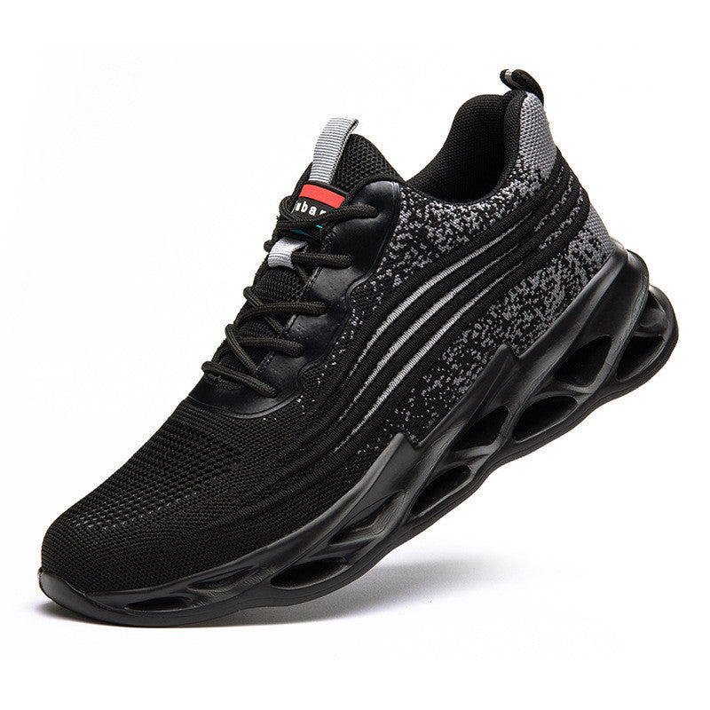 Black athletic safety shoe with unique sole design on a white background