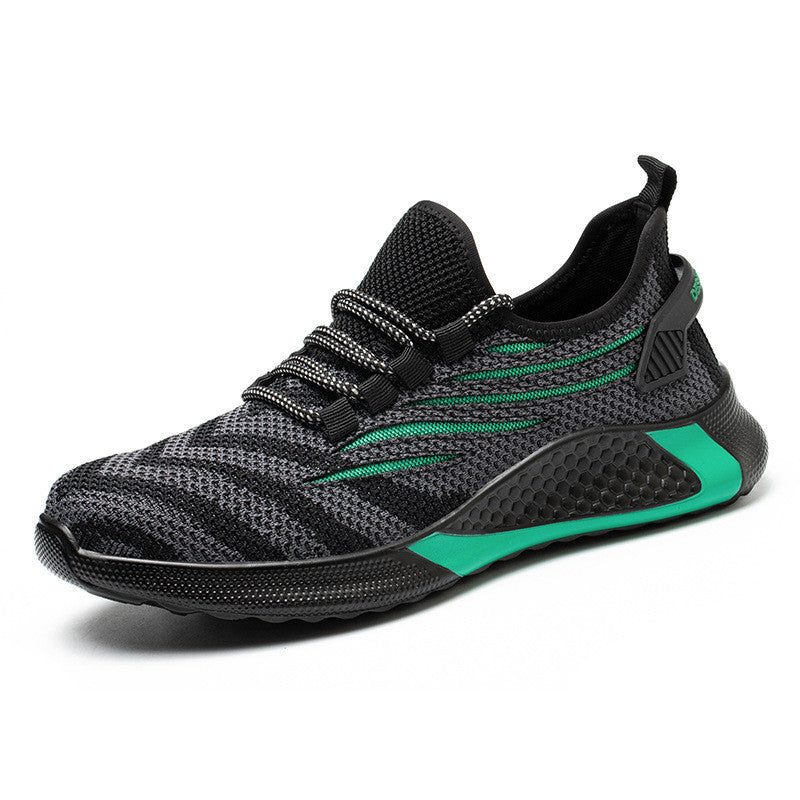 Black and green athletic safety shoe on a white background