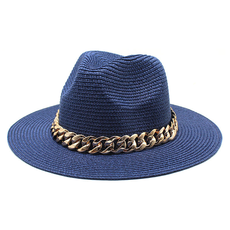 Blue straw hat with a gold chain band on a white background
