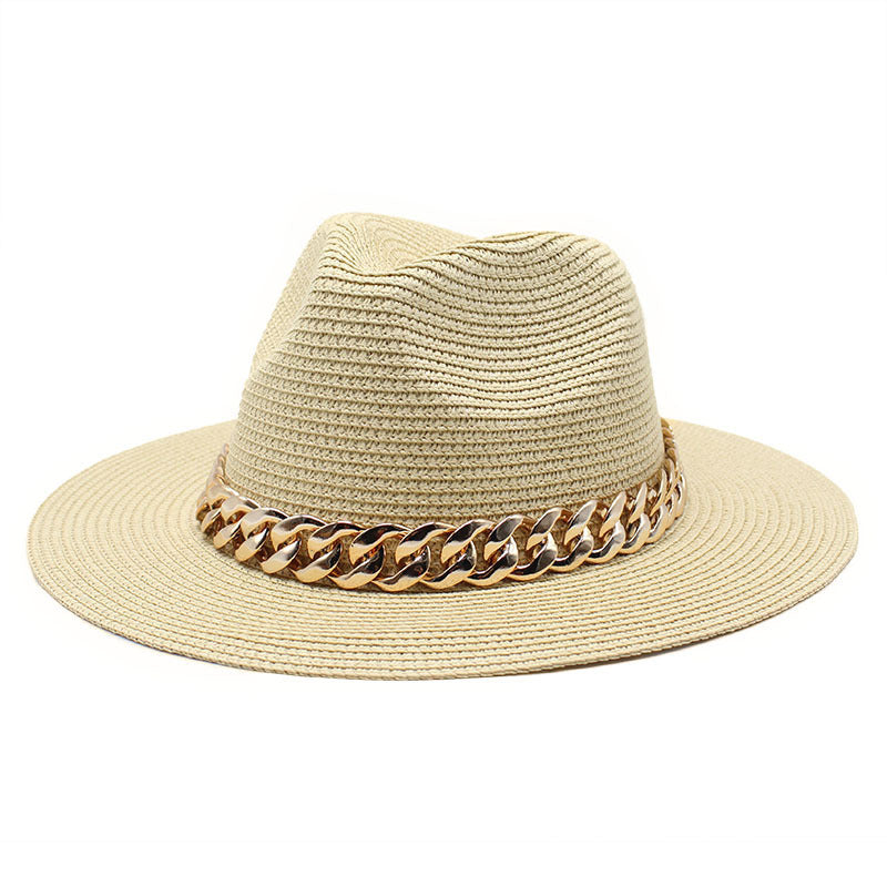 Beige straw hat with a gold chain band on a white background