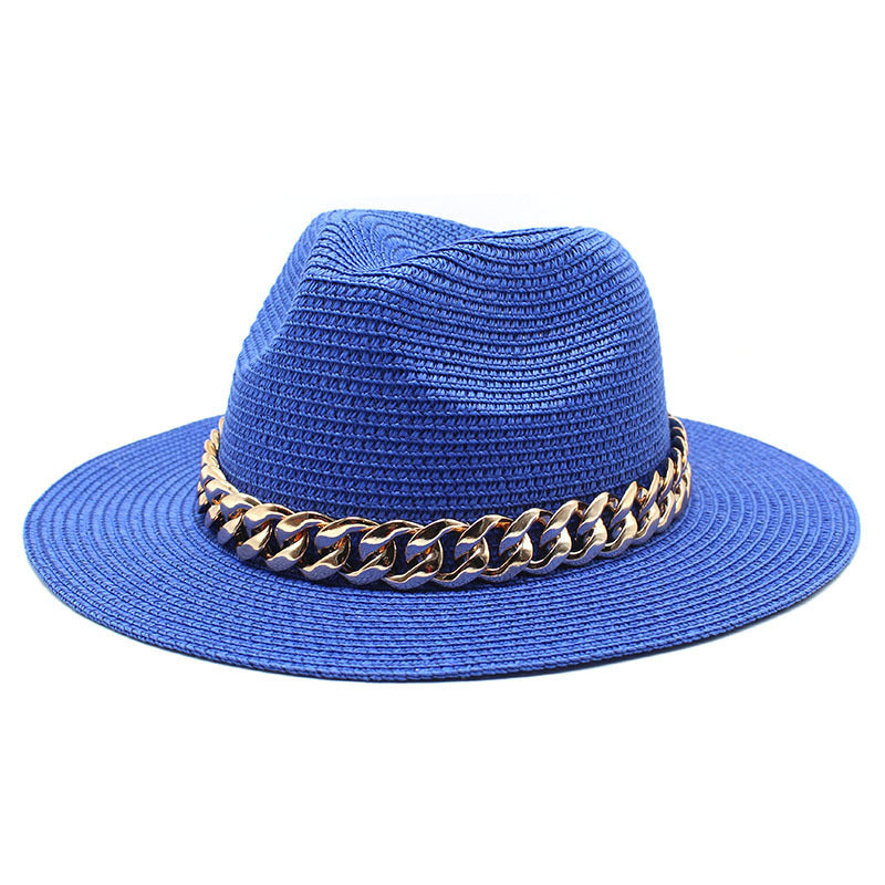 Blue straw hat with a gold chain band on a white background