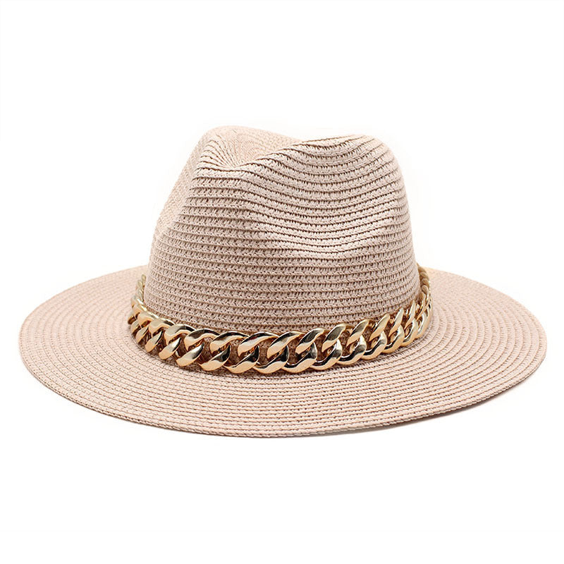 Beige straw hat with a gold chain band on a white background