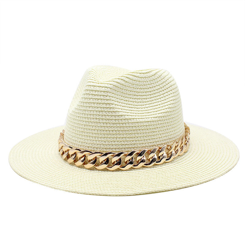 Beige straw hat with a gold chain band on a white background
