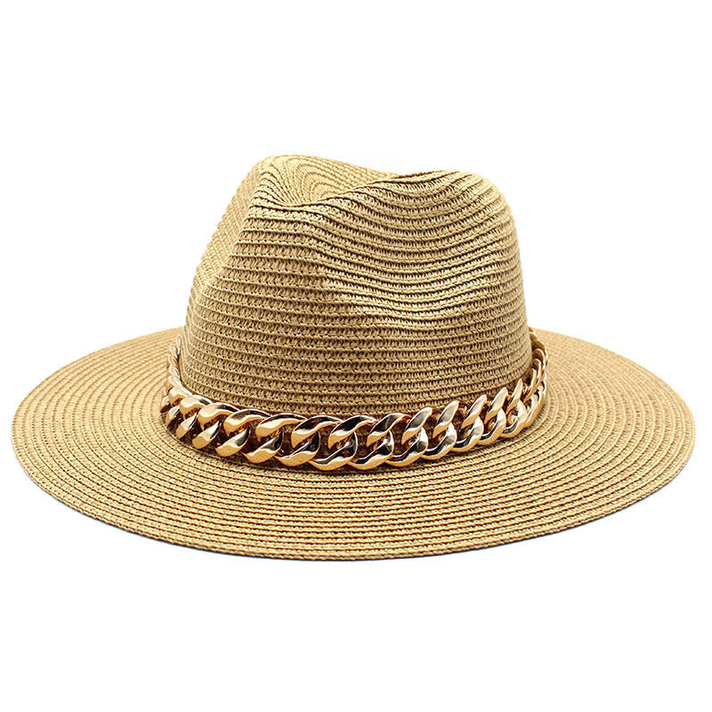Beige straw hat with a gold chain band on a white background