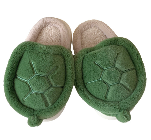 Pair of slippers with turtle shell design on a white background