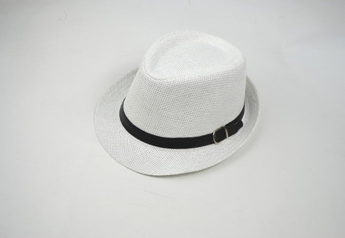 White straw hat with a black band on a light gray background