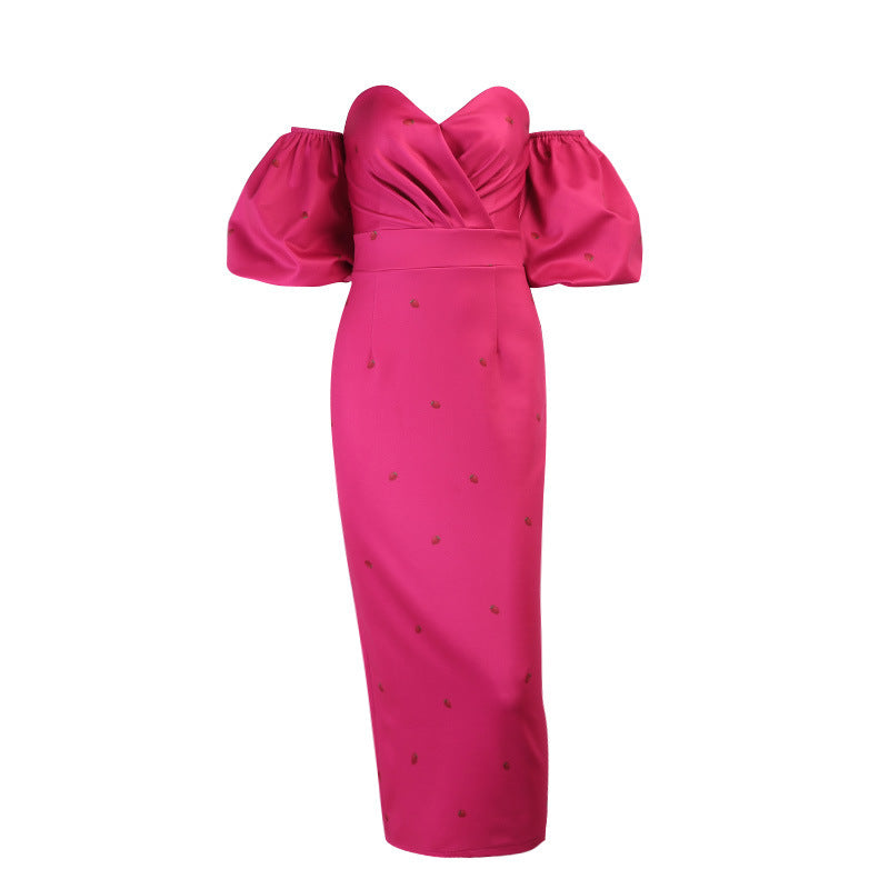 Pink dress with puff sleeves on a white background