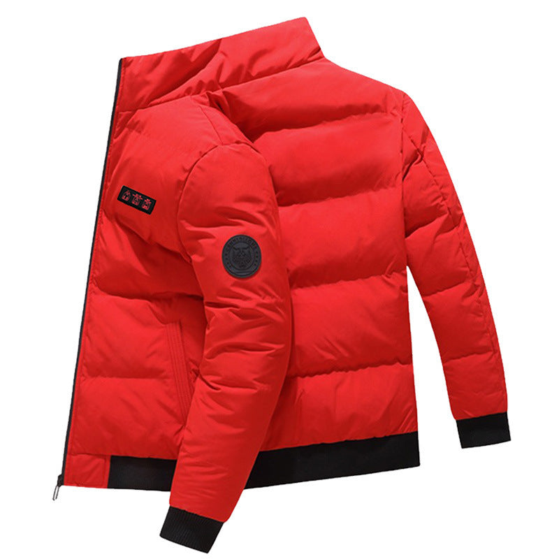 Red puffer jacket with black accents on a white background