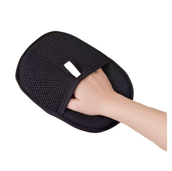 Black mesh slippers worn by a person on a white background