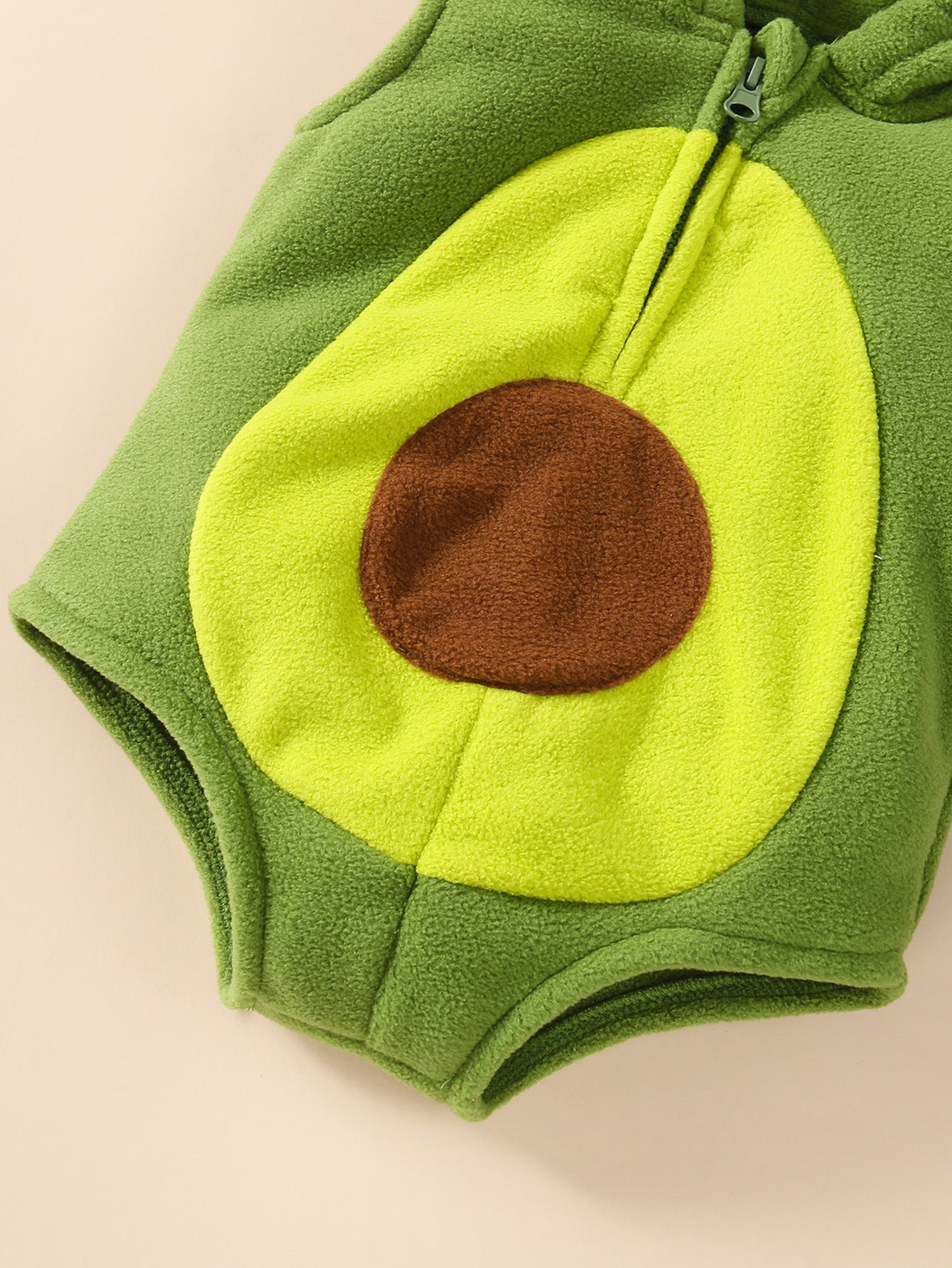 Green baby romper with avocado design