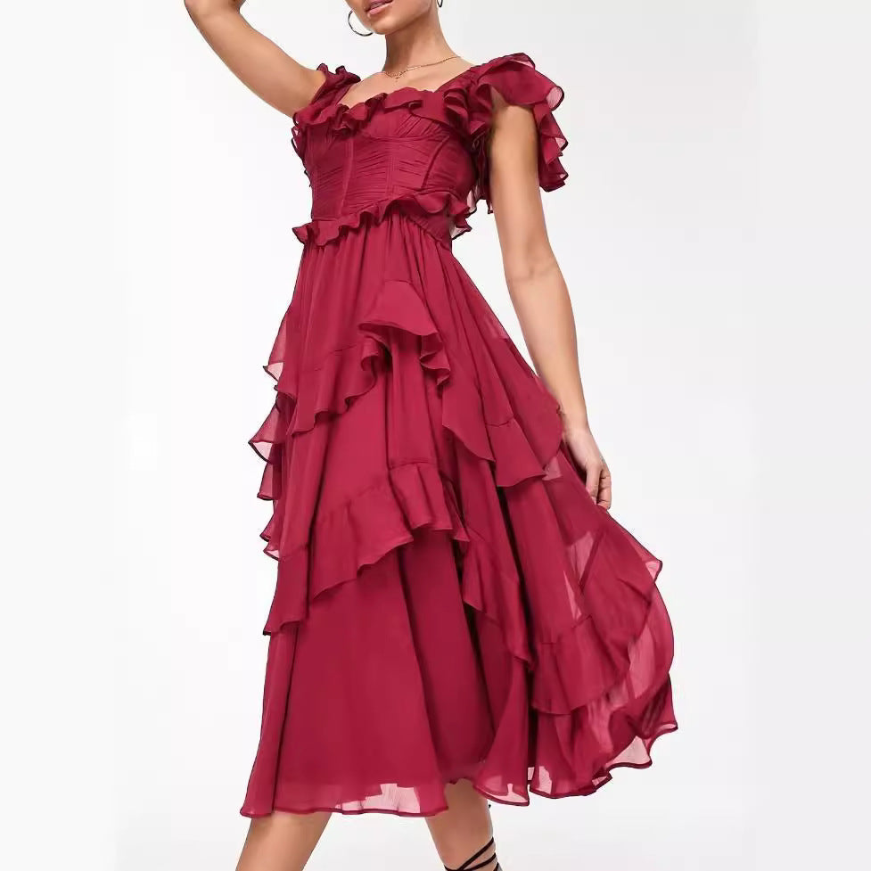 Red ruffled dress on a white background