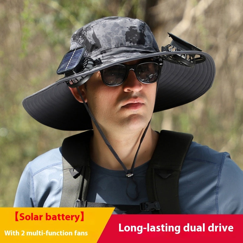 Person wearing a sun hat with solar battery and fans, outdoor setting