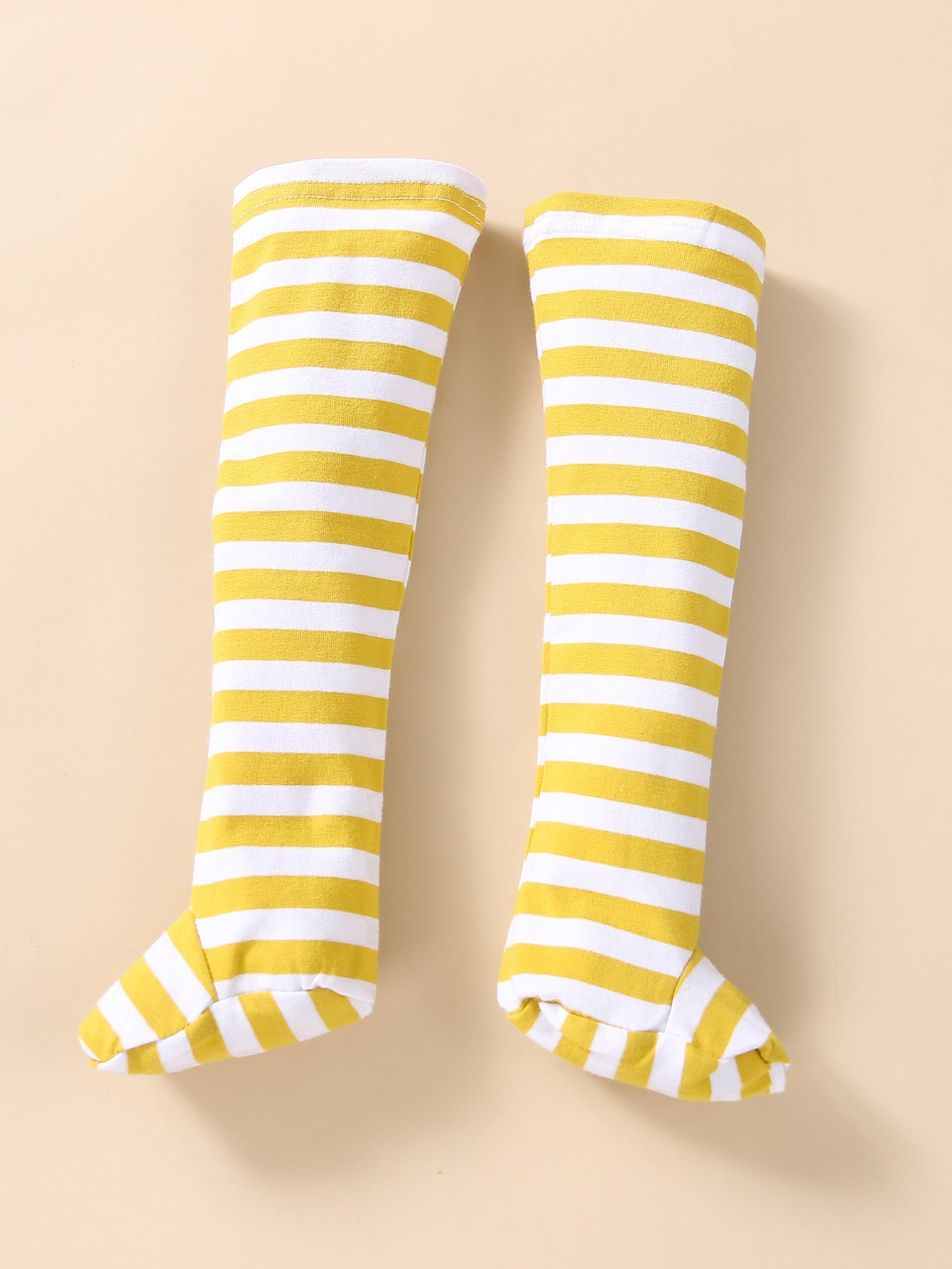 Yellow and white striped baby socks