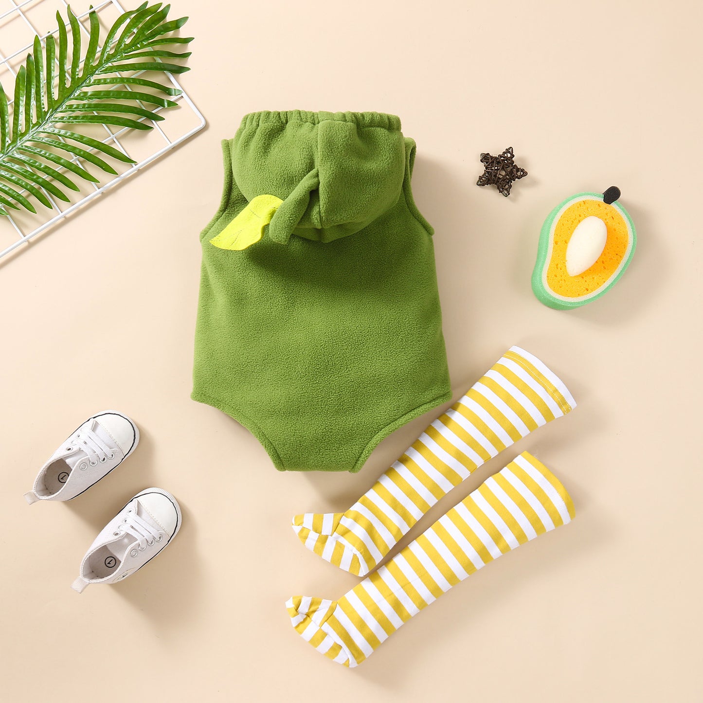 Back view of baby avocado romper with striped socks