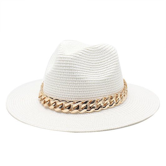 White straw hat with a gold chain band on a white background
