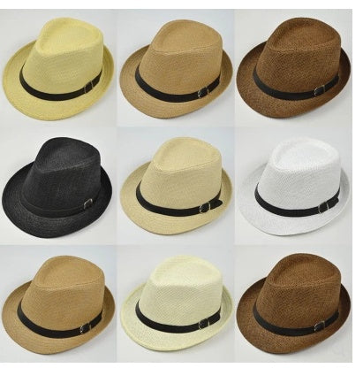 Collection of straw hats in various colors with black bands on a white background