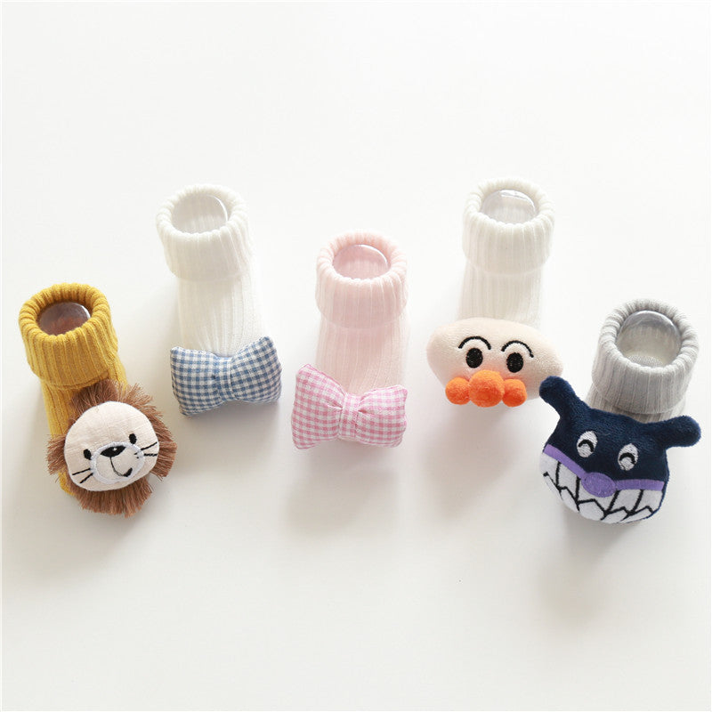 Set of baby socks with animal faces on a white background