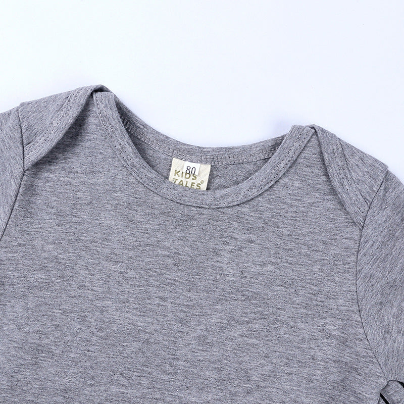 Gray baby onesie with a visible brand label on a white background