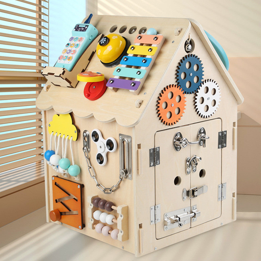 Wooden educational toy with various interactive elements on a light background