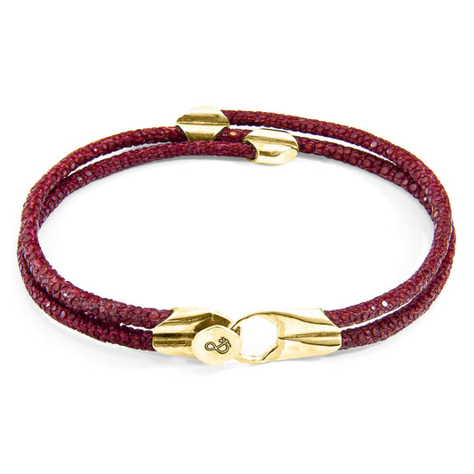 Luxury handcrafted Bordeaux red stingray leather bracelet with solid 9ct yellow gold clasp – minimalist British design on white background