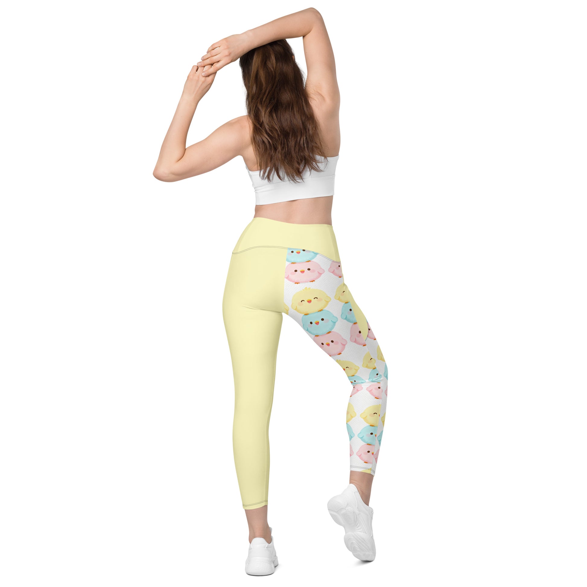 Back view of high-waisted crossover leggings with cute animal print and practical side pockets

