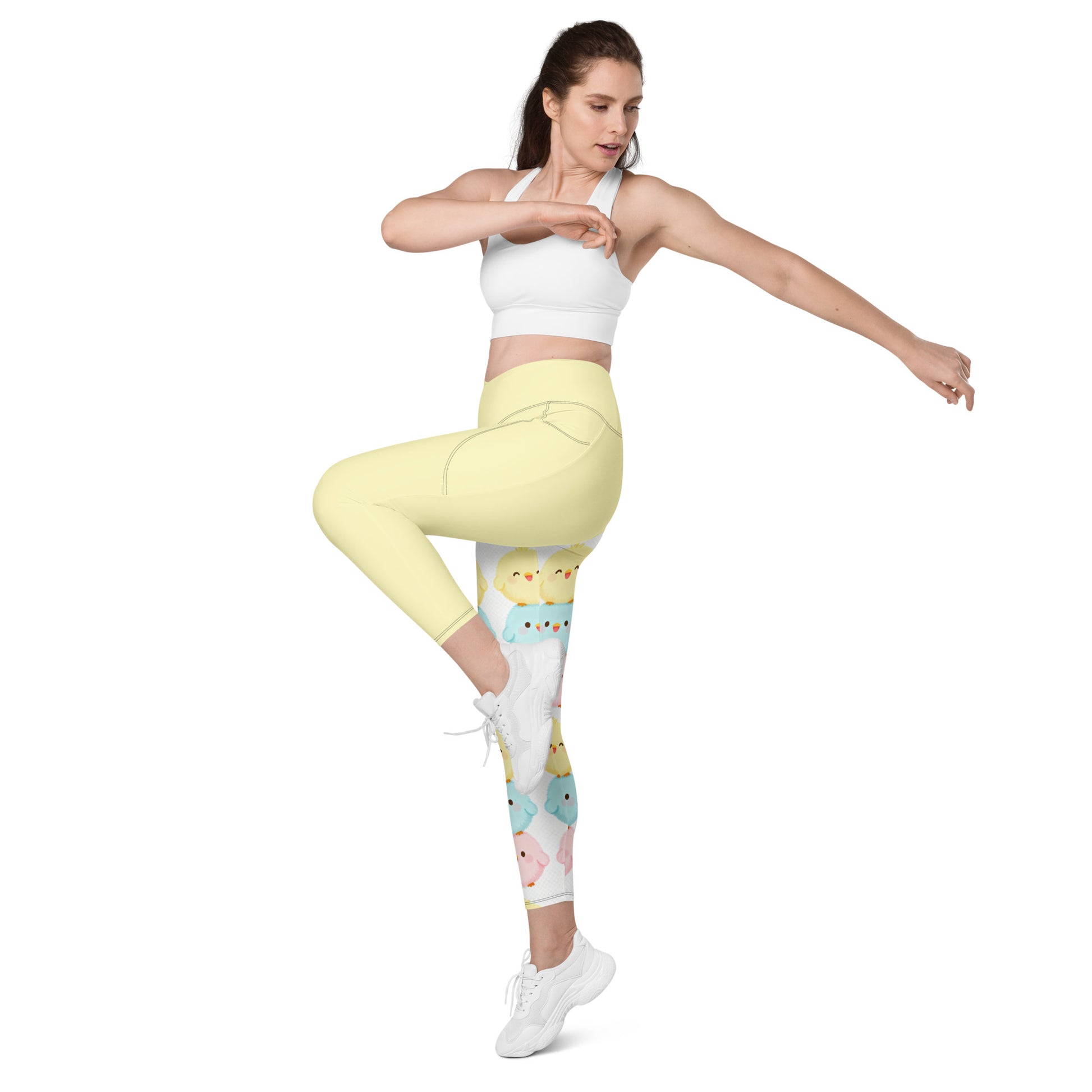 Side view showing flattering crossover waistband and kawaii animal design on women's activewear leggings

