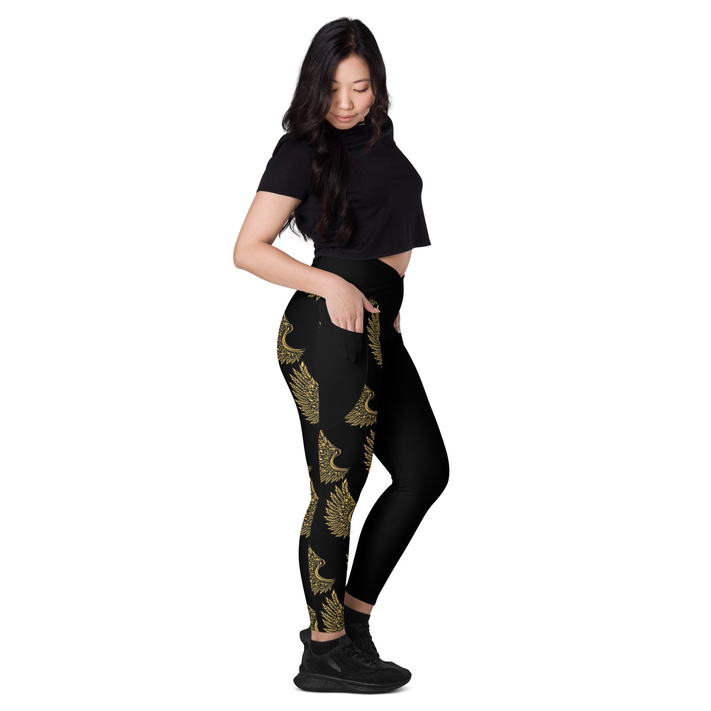 Right side view of golden crane crossover leggings showing solid black leg and high-waisted flattering fit
