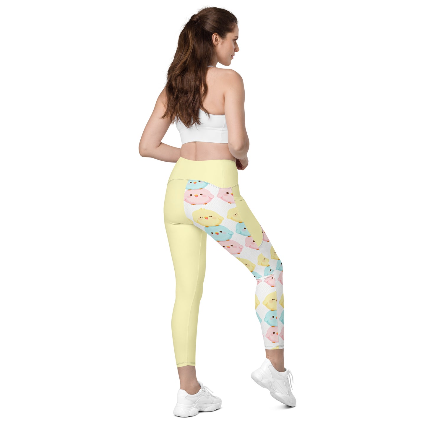Detailed view of adorable pastel animal characters print on eco-friendly recycled polyester leggings

