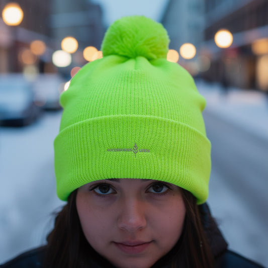 Neon green pom-pom beanie with golden embroidery - front view
