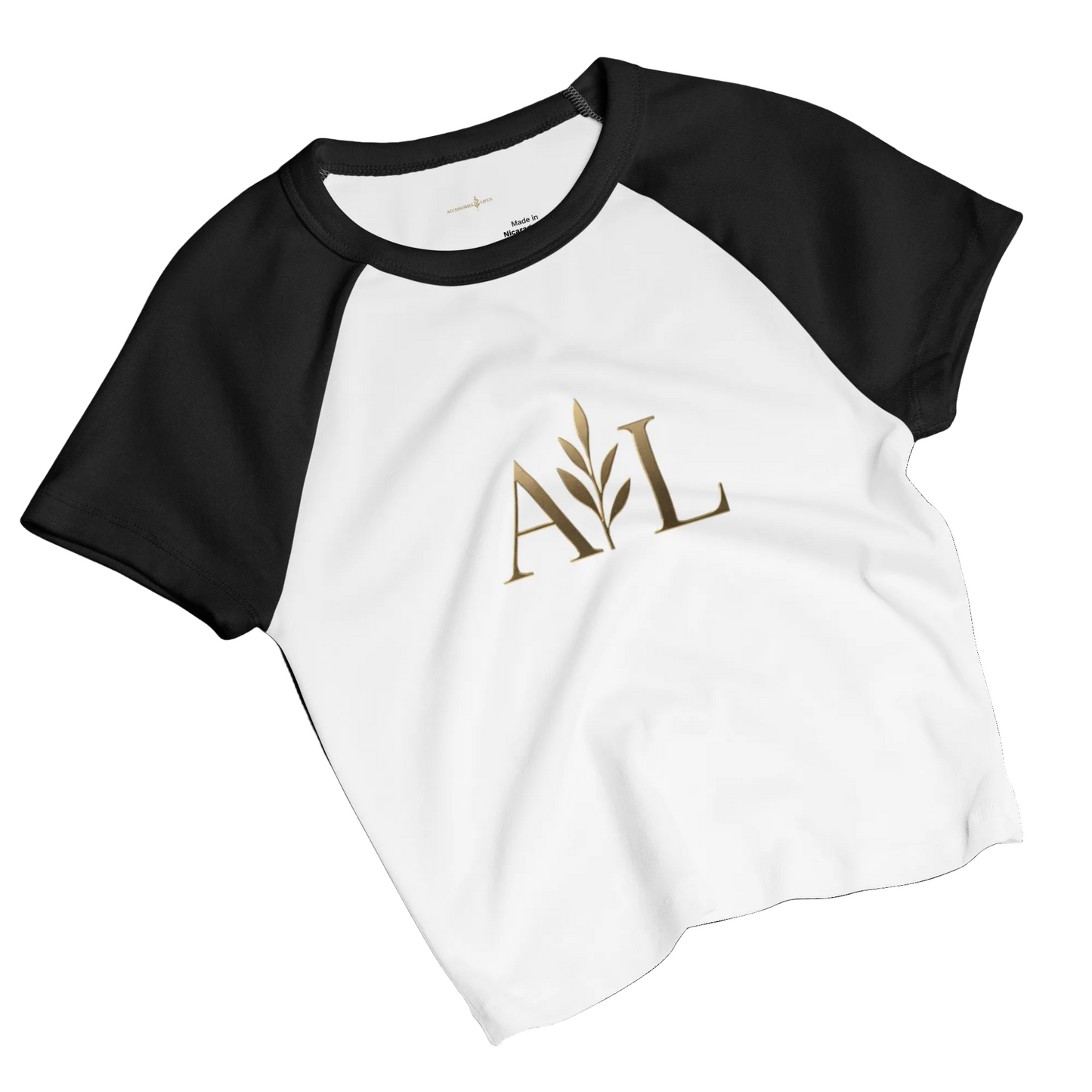 Women's fitted baby tee with raglan sleeves side angle view
